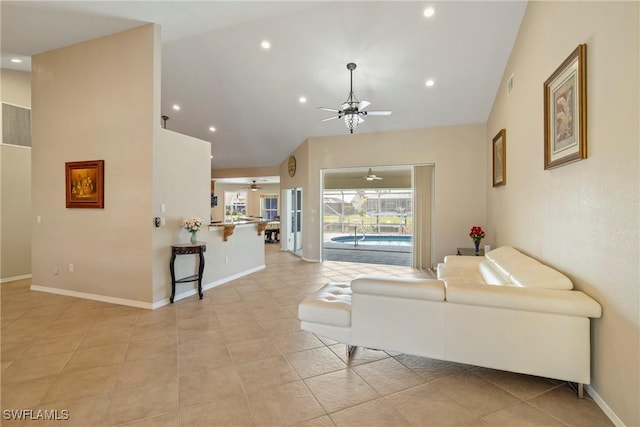 2817 La Mancha Ct, Punta Gorda, FL 33950 - living area with a ceiling fan, high vaulted ceiling, recessed lighting, and light tile patterned floors