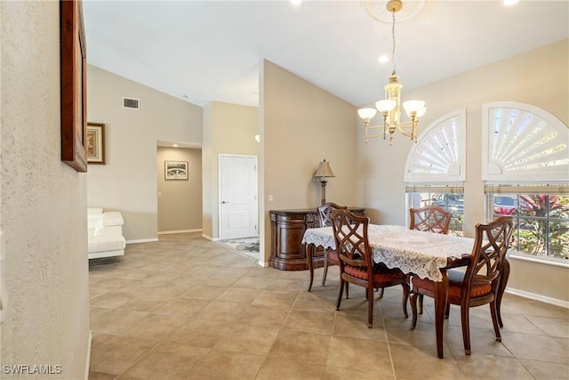2817 La Mancha Ct, Punta Gorda, FL 33950 - dining space featuring a chandelier, high vaulted ceiling, and light tile patterned floors