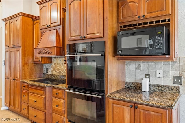 2817 La Mancha Ct, Punta Gorda, FL 33950 - kitchen featuring black appliances, custom range hood, decorative backsplash, and dark stone countertops