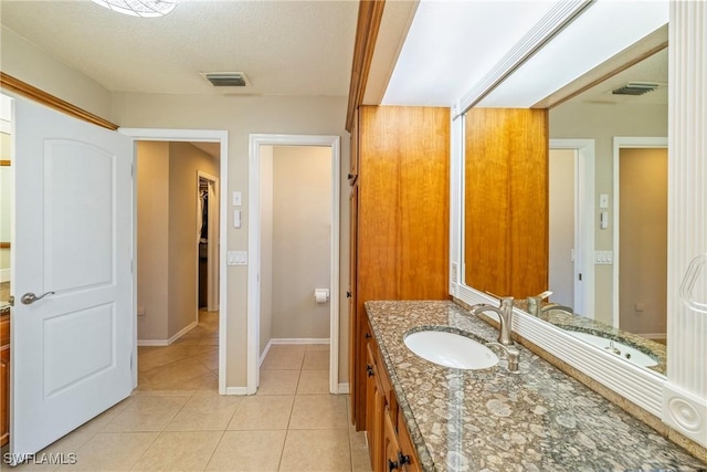 2817 La Mancha Ct, Punta Gorda, FL 33950 - bathroom featuring vanity and tile patterned floors