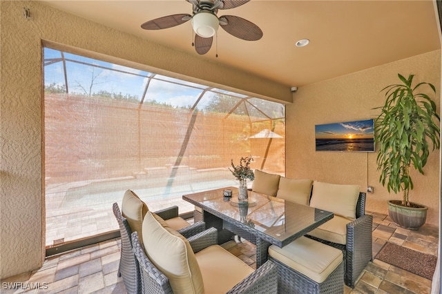 14482 Tuscany Pointe Trl, Naples, FL 34120 - view of patio featuring a ceiling fan and outdoor dining area