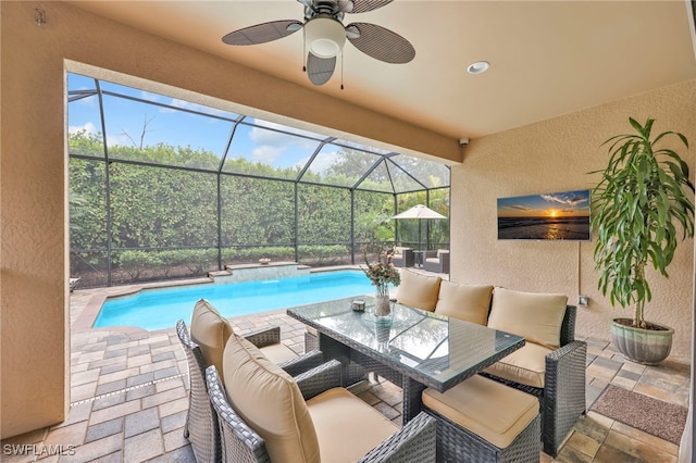 14482 Tuscany Pointe Trl, Naples, FL 34120 - view of patio with ceiling fan, a lanai, and an outdoor pool