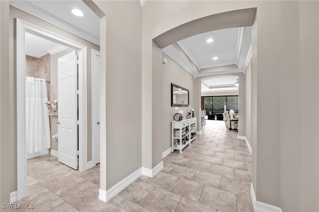 14482 Tuscany Pointe Trl, Naples, FL 34120 - hallway with arched walkways, crown molding, light tile patterned flooring, and recessed lighting
