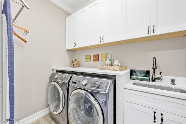 14482 Tuscany Pointe Trl, Naples, FL 34120 - clothes washing area featuring ornamental molding, washer and dryer, baseboards, a sink, and cabinet space