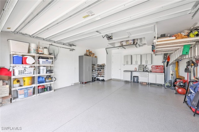 14482 Tuscany Pointe Trl, Naples, FL 34120 - garage with a garage door opener