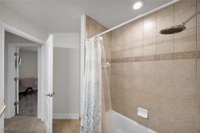 bathroom featuring tile patterned floors, shower / tub combo with curtain, baseboards, and recessed lighting