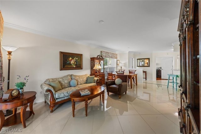 5045 Cedar Springs Dr Unit 104, Naples, FL 34110 - living area with baseboards, ornamental molding, and light tile patterned floors