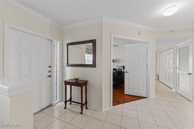 5045 Cedar Springs Dr Unit 104, Naples, FL 34110 - entrance foyer with light tile patterned floors, baseboards, and ornamental molding