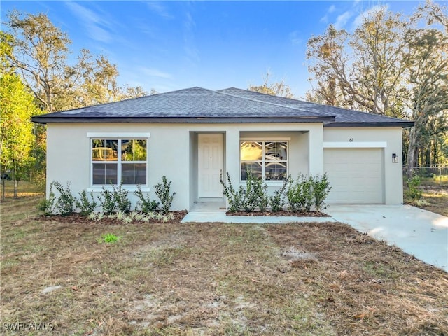 3309 55th St W, Lehigh Acres, FL 33971 - ranch-style home featuring stucco siding, a shingled roof, and a garage