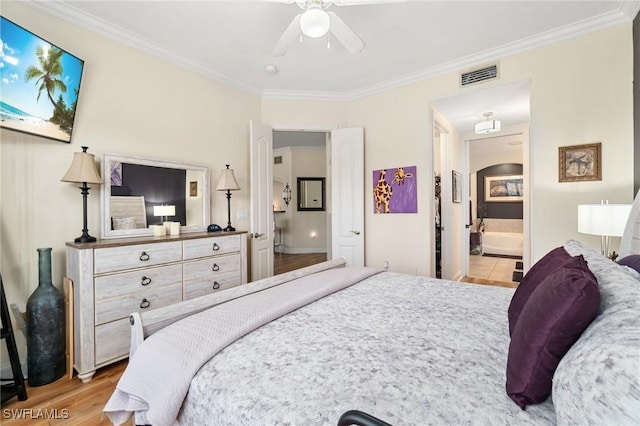1259 Carpazi Ct Unit 302, Naples, FL 34105 - bedroom featuring visible vents, crown molding, and baseboards