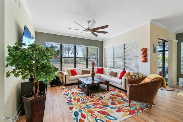 1259 Carpazi Ct Unit 302, Naples, FL 34105 - living room with ornamental molding, light wood finished floors, and a ceiling fan