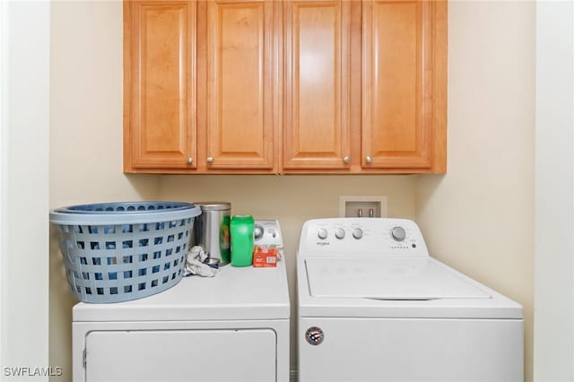 1259 Carpazi Ct Unit 302, Naples, FL 34105 - washroom with cabinet space and independent washer and dryer