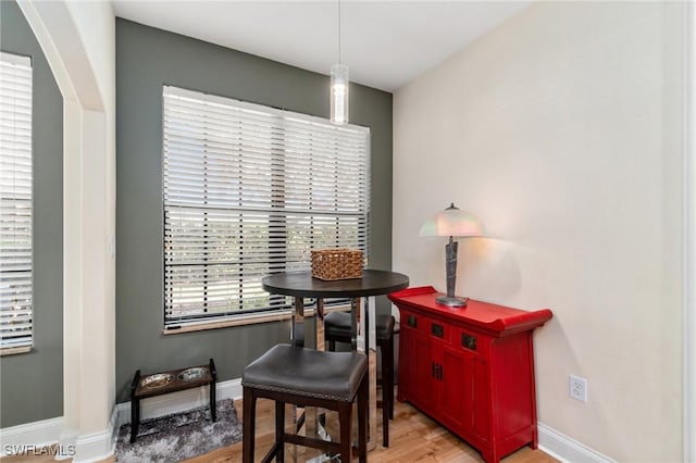 1259 Carpazi Ct Unit 302, Naples, FL 34105 - interior space with baseboards and light wood-style flooring