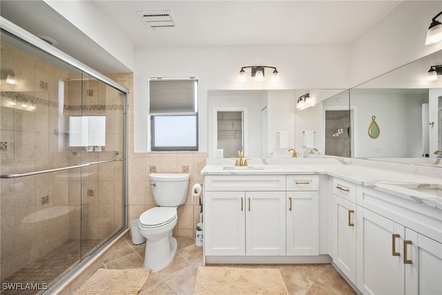 20640 Porthole Ct, Estero, FL 33928 - full bath featuring toilet, tile patterned floors, visible vents, and a stall shower