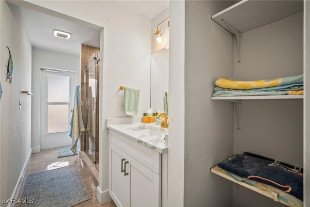 20640 Porthole Ct, Estero, FL 33928 - bathroom featuring baseboards, a shower stall, visible vents, and vanity