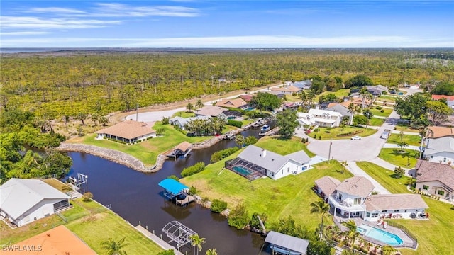 20640 Porthole Ct, Estero, FL 33928 - bird's eye view with a view of trees, a water view, and a residential view