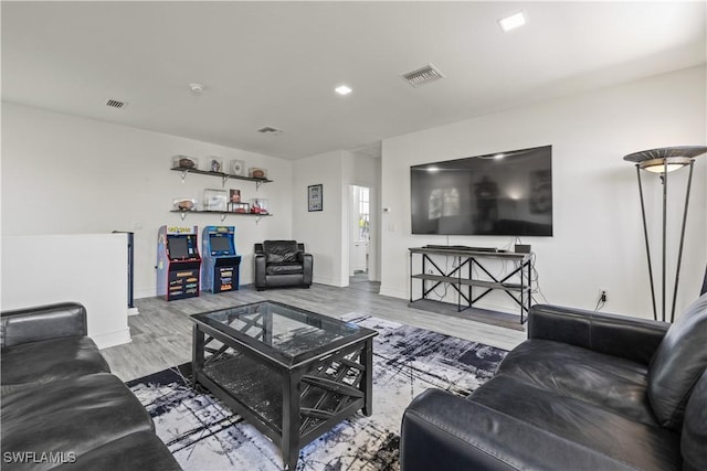3007 8th St W, Lehigh Acres, FL 33971 - living area featuring wood finished floors and baseboards