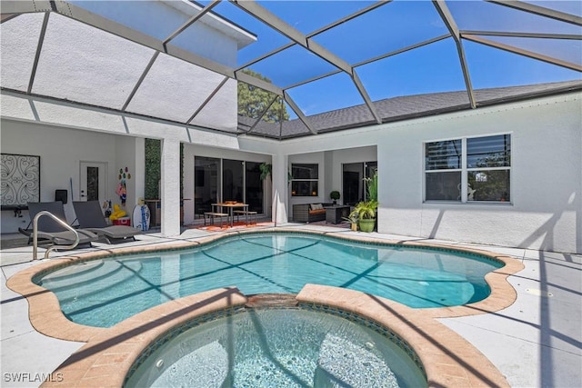3007 8th St W, Lehigh Acres, FL 33971 - view of swimming pool with a patio, a pool with connected hot tub, and glass enclosure