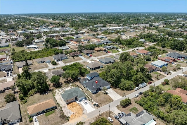 3007 8th St W, Lehigh Acres, FL 33971 - aerial view of property's location with nearby suburban area
