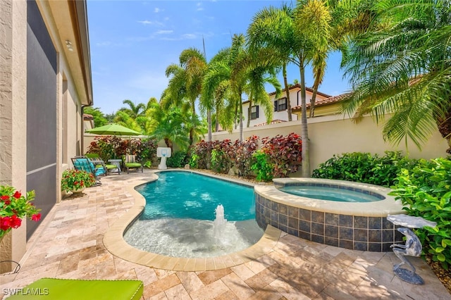 7996 Cordoba Pl, Naples, FL 34113 - view of pool featuring an in-ground hot tub, a patio, and a fenced backyard