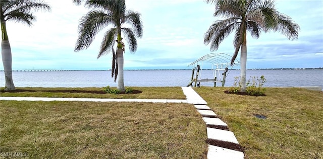 water view with boat lift and a dock