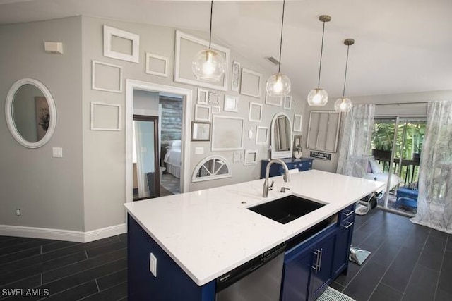 kitchen with a sink, baseboards, dishwasher, blue cabinets, and lofted ceiling