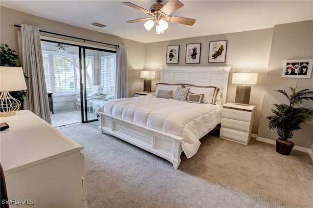 bedroom featuring access to exterior, light colored carpet, ceiling fan, and visible vents
