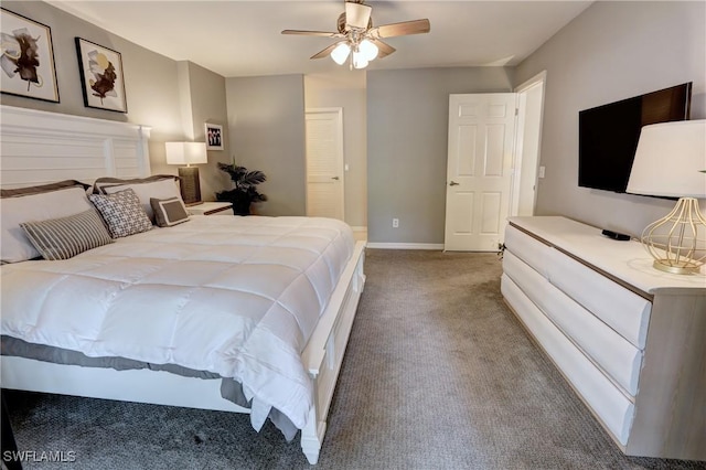 bedroom featuring light carpet, baseboards, and ceiling fan