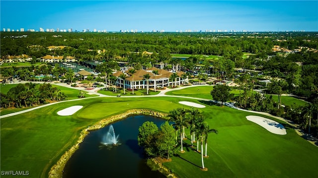 birds eye view of property with a city view, a water view, and golf course view