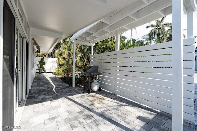 view of patio / terrace featuring fence and area for grilling