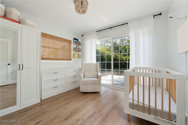 bedroom with light wood-type flooring