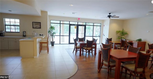 dining area with light tile patterned floors, ceiling fan, recessed lighting, and visible vents