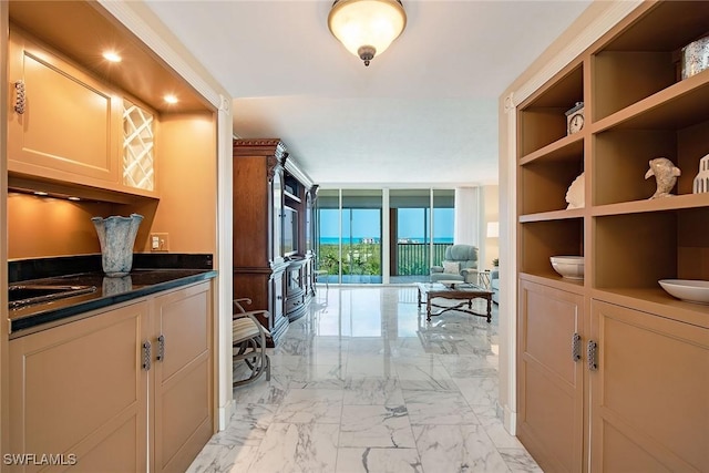 7515 Pelican Bay Blvd Unit 7B, Naples, FL 34108 - corridor with marble finish floor and a sink