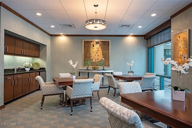 7515 Pelican Bay Blvd Unit 7B, Naples, FL 34108 - dining area with visible vents, crown molding, carpet flooring, and recessed lighting
