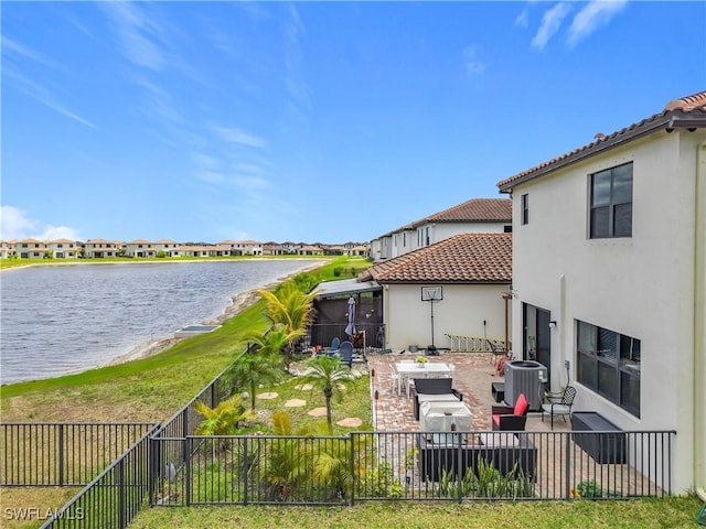 water view featuring a residential view and a fenced backyard