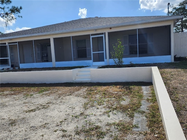208/210 Ichabod Ave, Lehigh Acres, FL 33973 - back of property featuring a sunroom