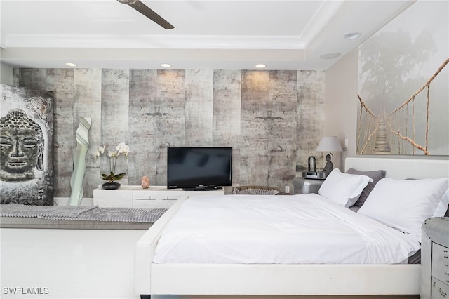 bedroom with ornamental molding and recessed lighting