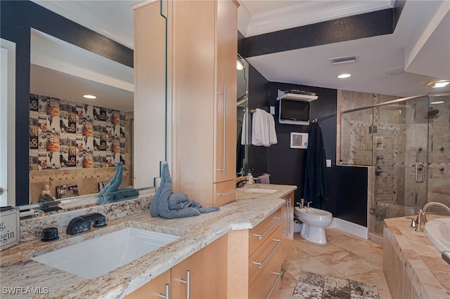 full bathroom featuring a sink, double vanity, a stall shower, and a bidet