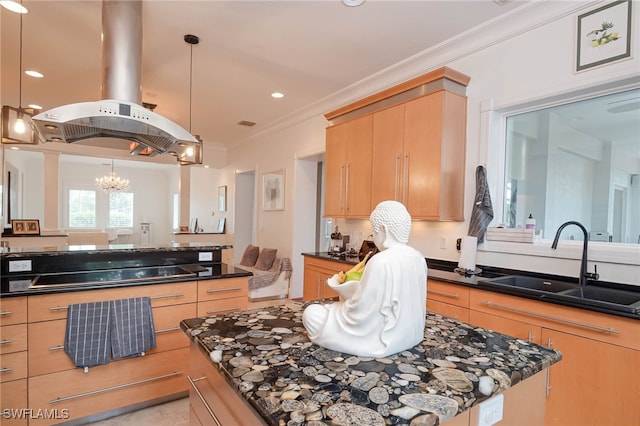 kitchen with black electric stovetop, dark countertops, crown molding, and a sink