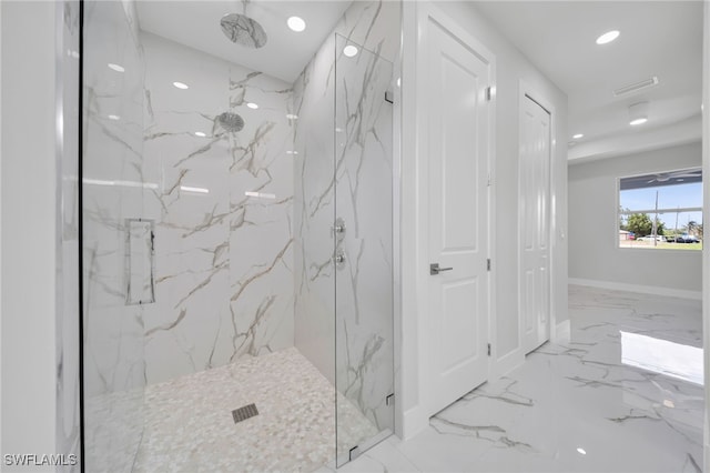 2932 18th St SW, Lehigh Acres, FL 33976 - bathroom featuring marble tiled flooring, a marble finish shower, recessed lighting, and baseboards