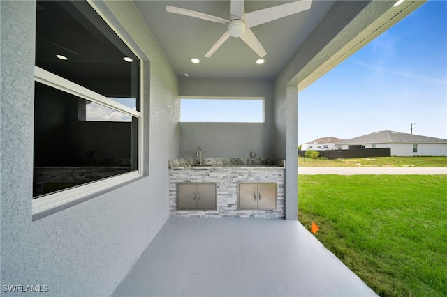 2932 18th St SW, Lehigh Acres, FL 33976 - view of patio with area for grilling and ceiling fan