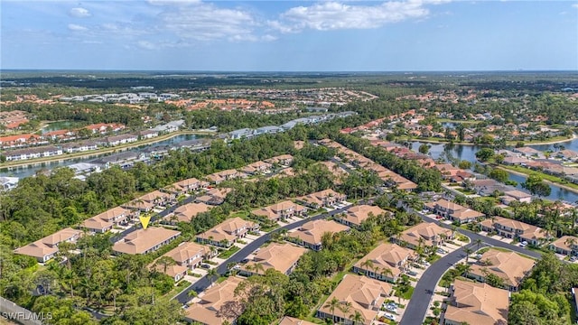 aerial view featuring a residential view and a water view