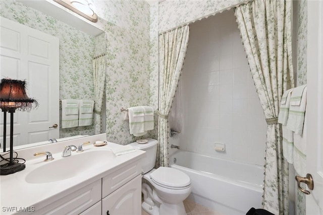 bathroom featuring toilet, wallpapered walls, shower / tub combo, and vanity