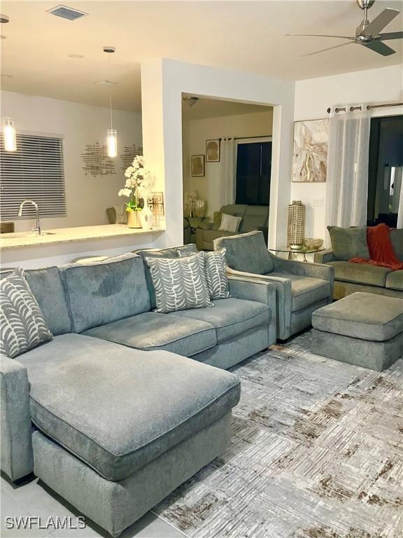 5690 Agostino Way, Ave Maria, FL 34142 - living area featuring ceiling fan