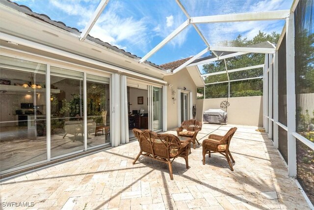 sunroom featuring an outdoor living space