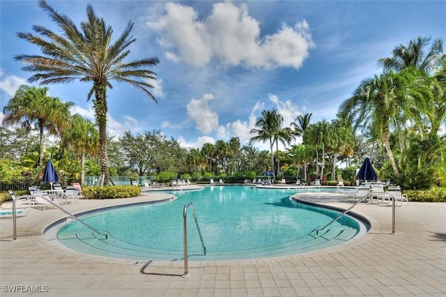 pool with a patio