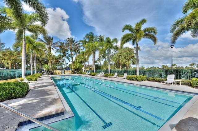community pool with fence