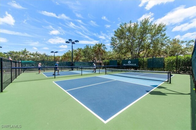 view of sport court with fence and community basketball court