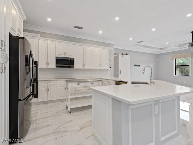 2538 4th Ave NE, Naples, FL 34120 - kitchen featuring white cabinets, a sink, appliances with stainless steel finishes, visible vents, and marble finish floor