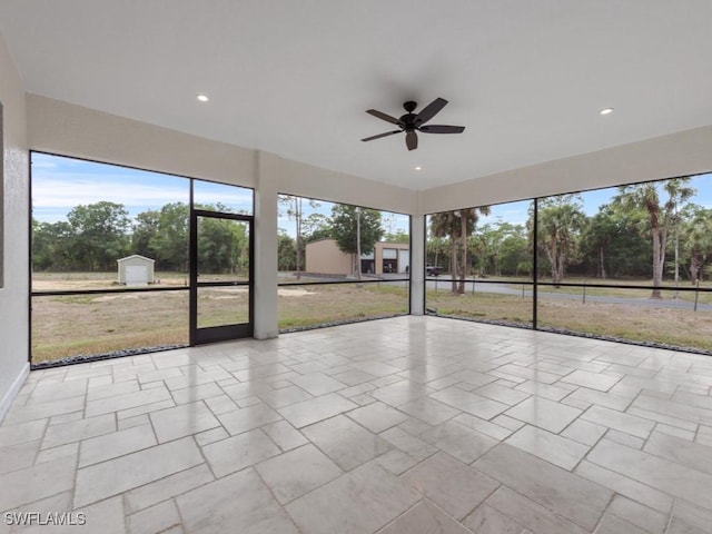 2538 4th Ave NE, Naples, FL 34120 - unfurnished sunroom featuring a healthy amount of sunlight